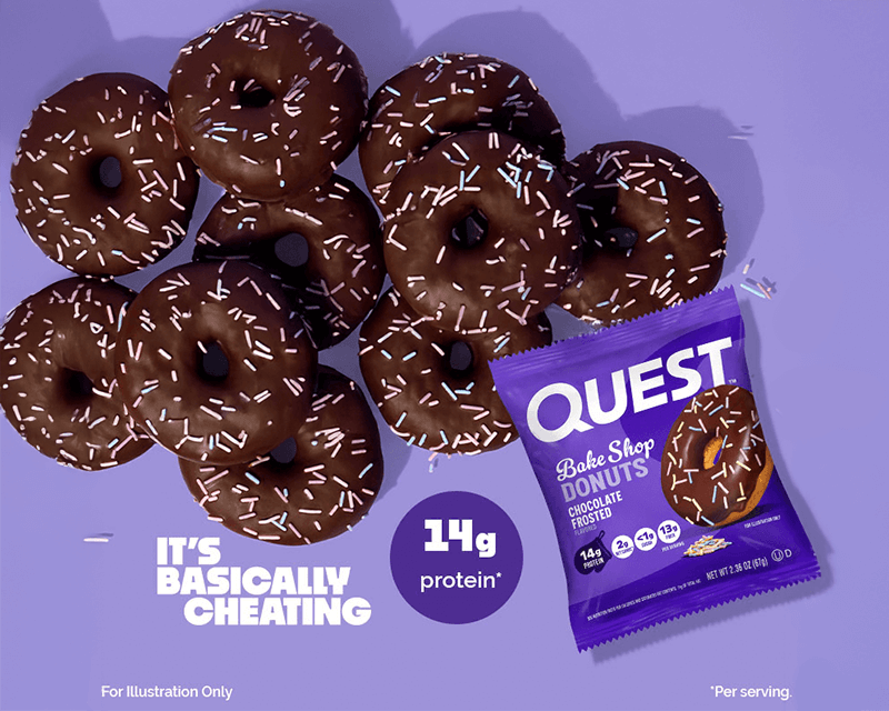 Chocolate frosted donuts with sprinkles are piled next to a purple Quest Bake Shop Donuts package. The packaging highlights 14g protein per serving. The background is light purple with "It's basically cheating" text.