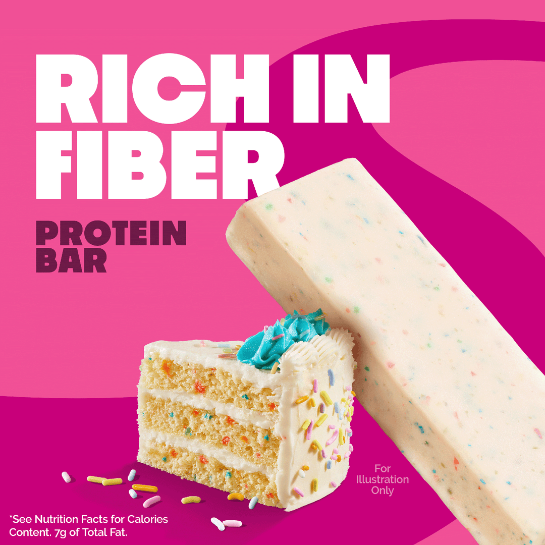 Quest Birthday Cake Protein Bar with birthday cake slice and protein bar on a pink background.