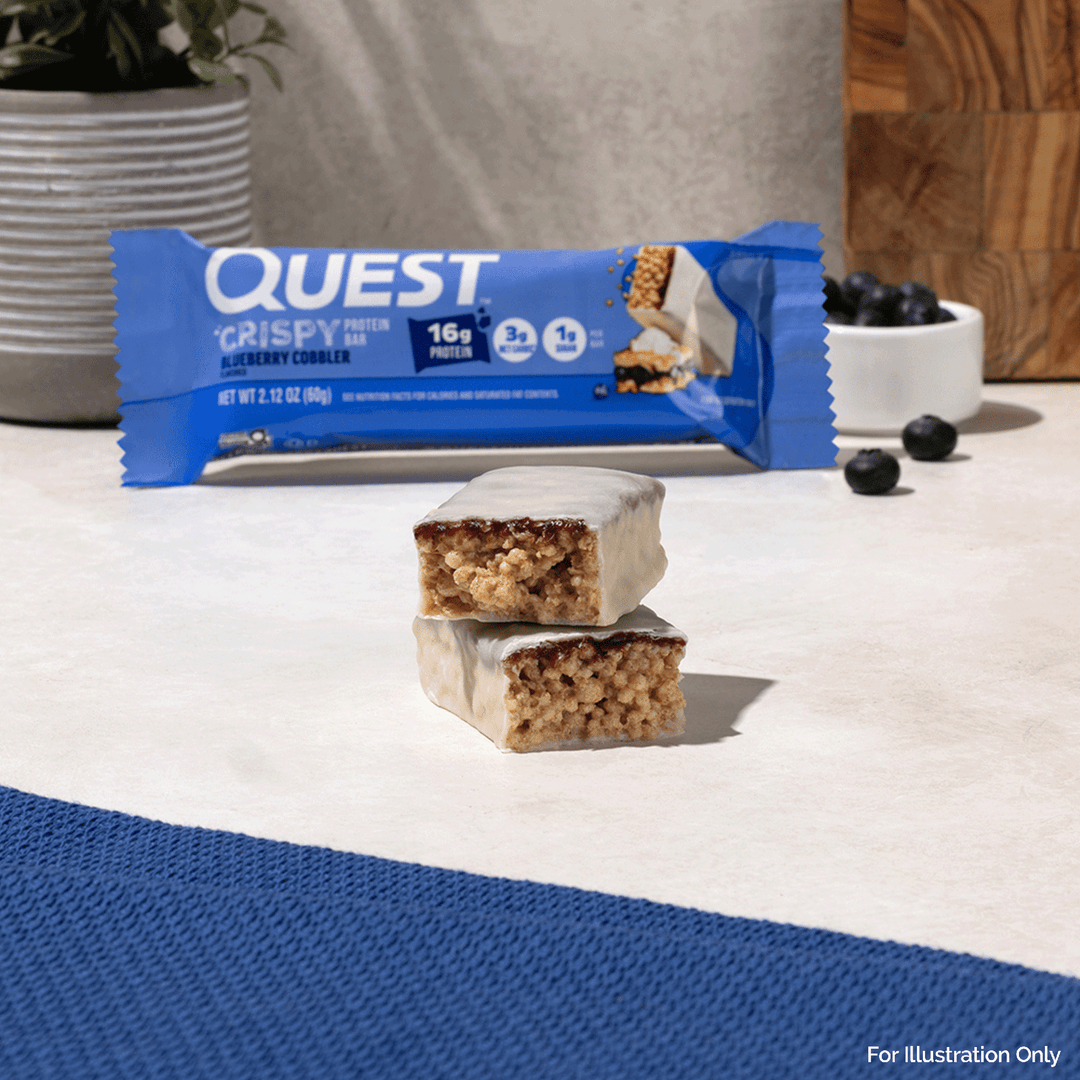 Quest Crispy protein bar with packaging on a surface