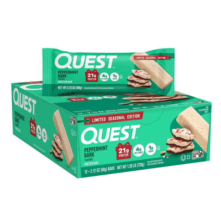 A box of Quest Peppermint Bark flavored protein bars with a single bar wrapped in branded green packaging placed on top