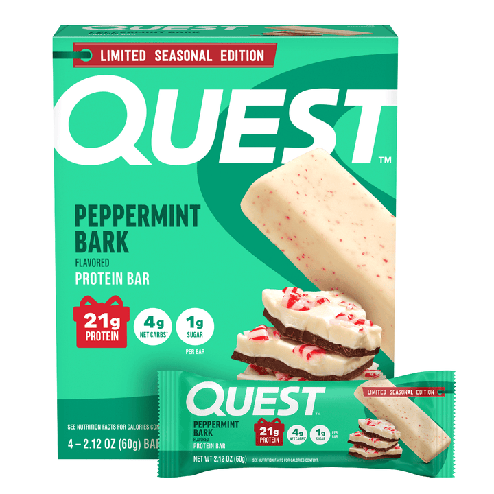 A box of Quest Peppermint Bark flavored protein bar, Limited Seasonal Edition, with a large image of the white and red bark bar on the front and a small single wrapped bar shown at the bottom right.