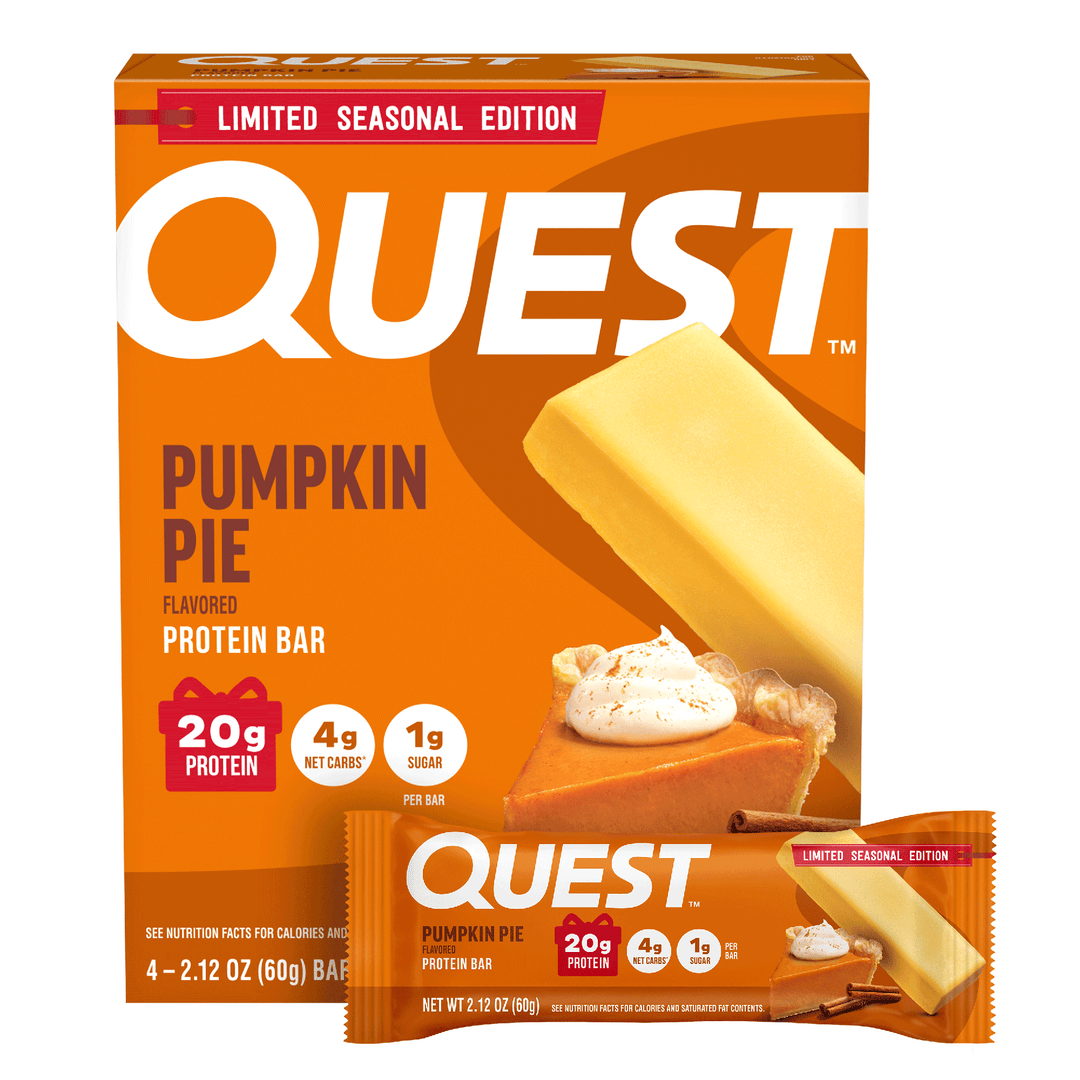 Quest Pumpkin Pie flavored protein bar box with a single bar shown in front, on a clean white background. The packaging is bright orange with large white QUEST branding and pumpkin pie imagery.