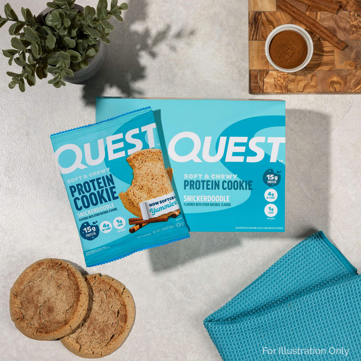 Snickerdoodle Protein Cookies unwrapped cookies with cinnamon  next to it