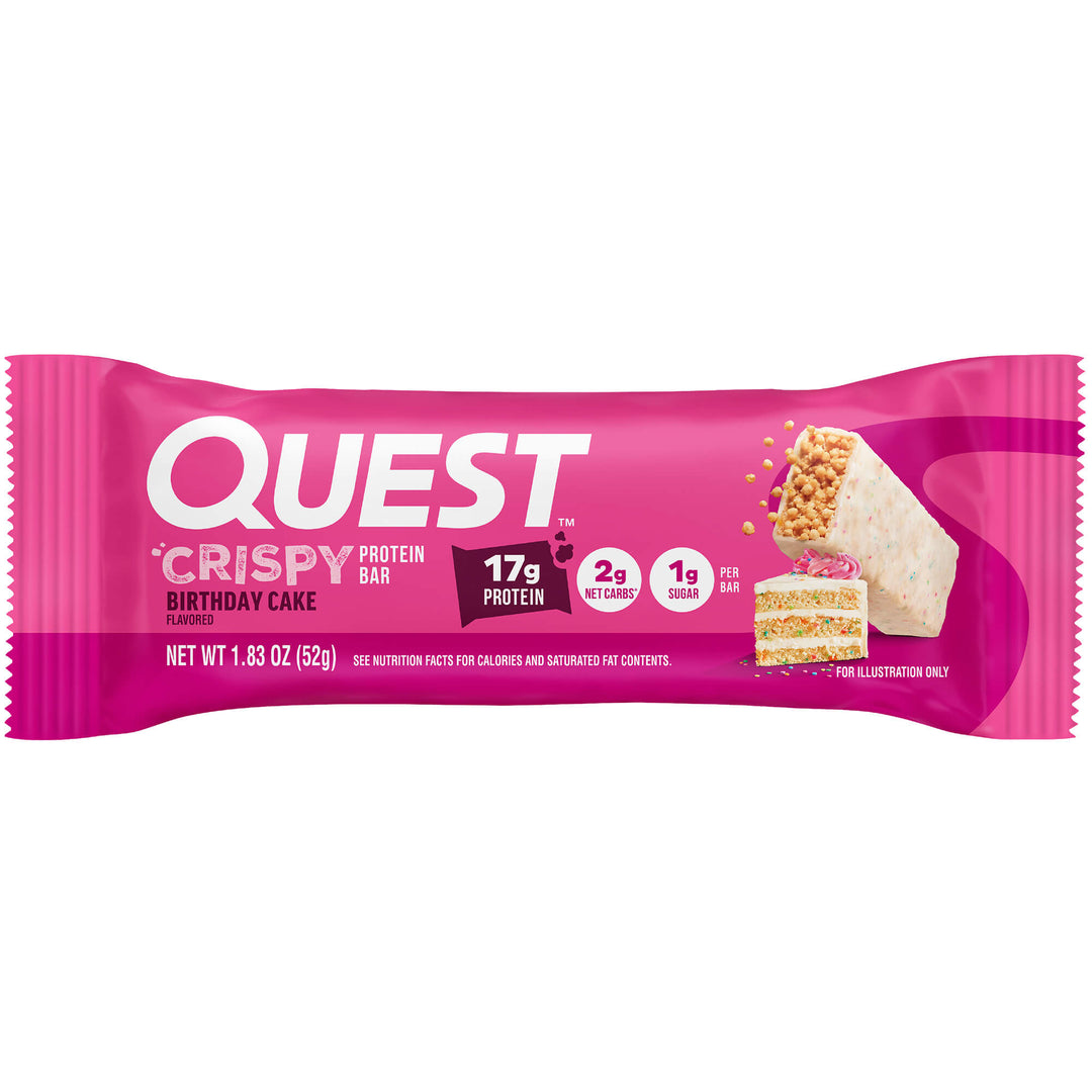 Pink packaging of a Quest Crispy Birthday Cake Protein Bar. Text highlights 17g protein, 2g net carbs, and 1g sugar. Cake illustration on the right.