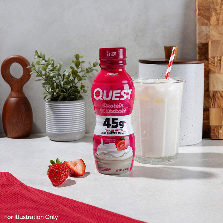 Strawberry 45g Protein Milkshake with straws and strawberries on the kitchen table