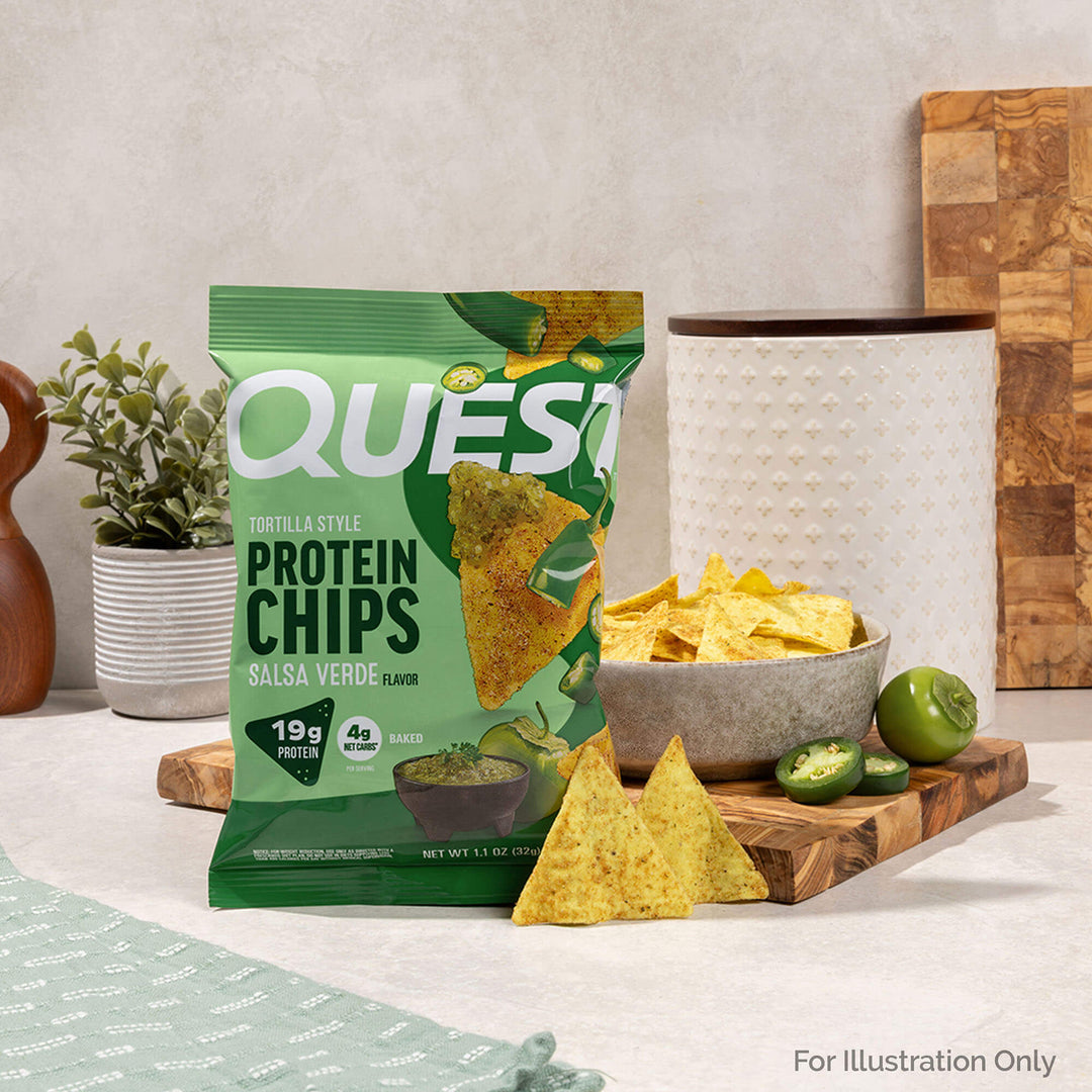 Salsa Verde Tortilla Style Protein Chips and chilies on the kitchen table.