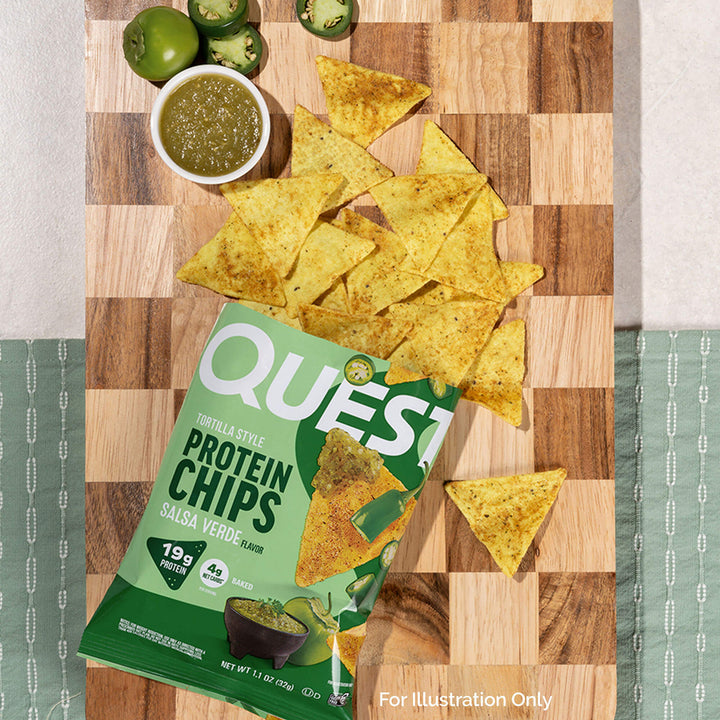 Salsa Verde Tortilla Style Protein Chips and chilies on the kitchen table.