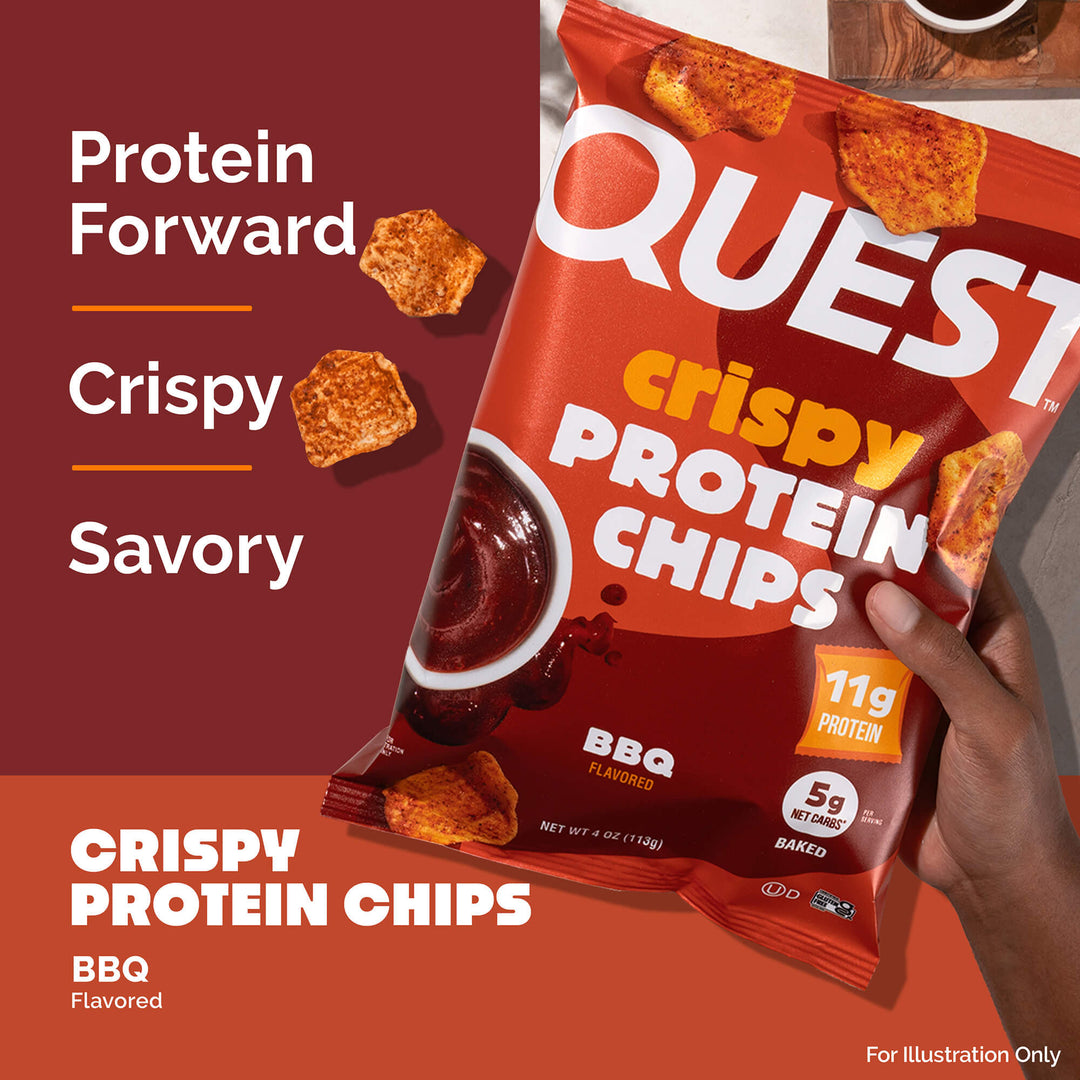 Close-up of a Quest BBQ Crispy Protein Chips bag held by a hand. Text reads "Protein Forward, Crispy, Savory." The design is bold and appetizing.