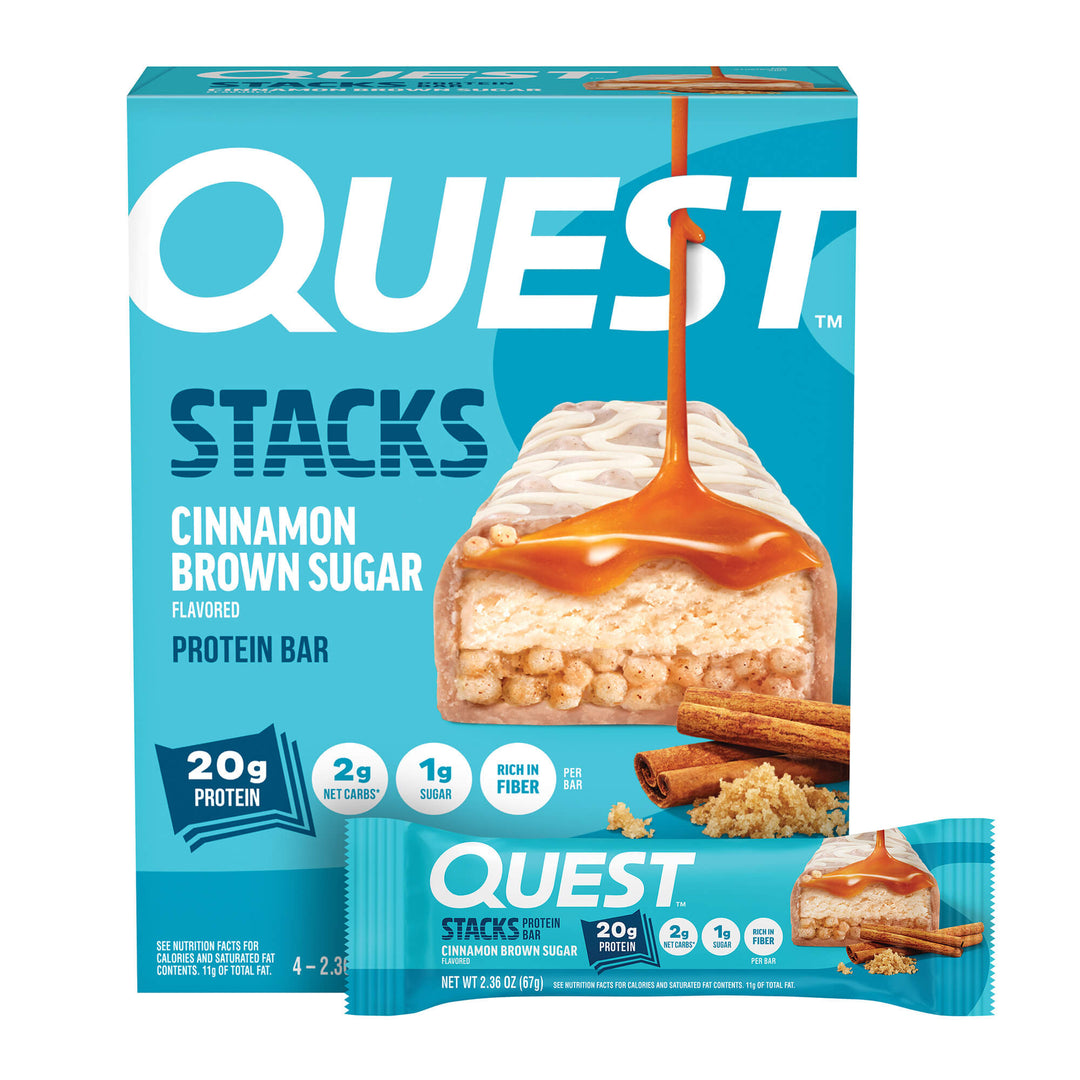 Box of Quest Stacks protein bars in cinnamon brown sugar flavor with an image of a caramel drizzle over a bar. Includes high-protein, low-carb details.