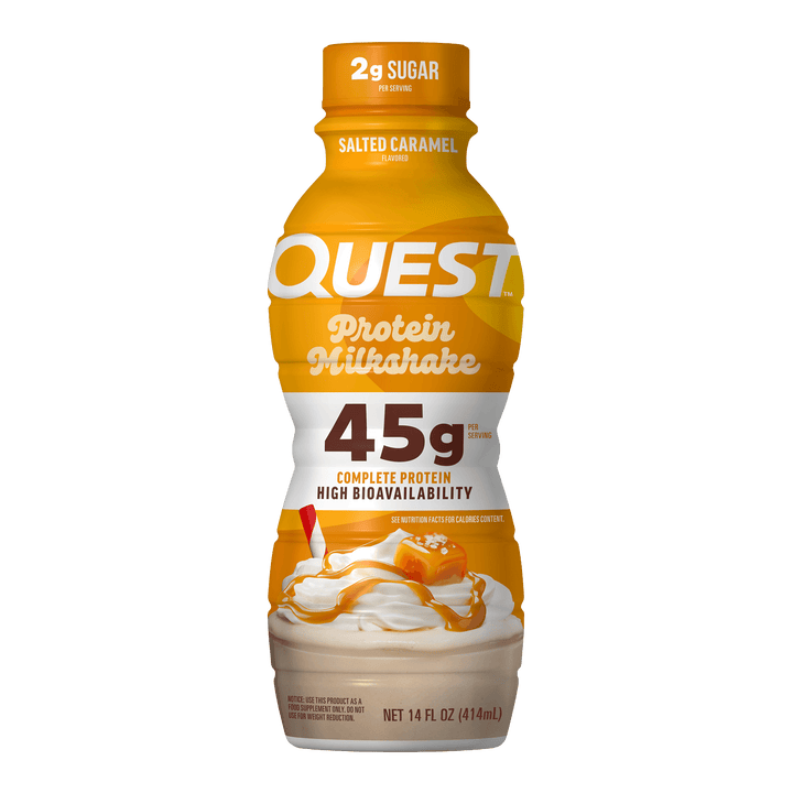 A bottle of Quest Protein Milkshake in Salted Caramel flavor, featuring a bright yellow and white label with a graphic of a vanilla milkshake topped with caramel drizzle.