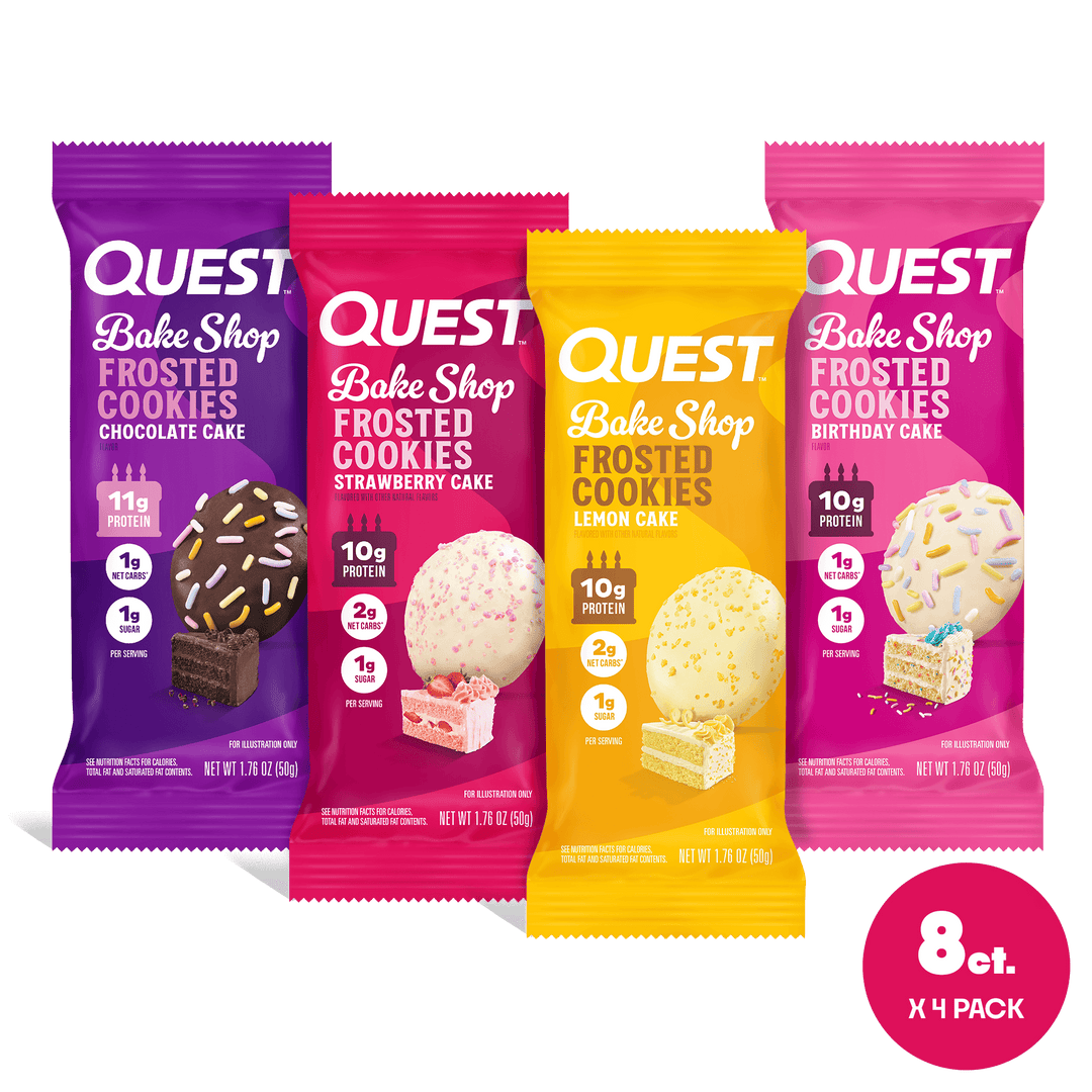Four colorful Quest Bake Shop Frosted Cookies packages are shown: purple (Chocolate Cake), pink (Strawberry Cake), yellow (Lemon Cake), and magenta (Birthday Cake). Each package highlights protein content and flavor. A "8ct. x 4 pack" label is at the bottom right.